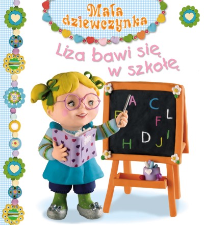 Liza bawi się w szkołę. Mała dziewczynka